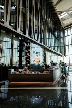 Elegant interior of a luxury hotel in Dubai featuring a Godiva chocolate display.