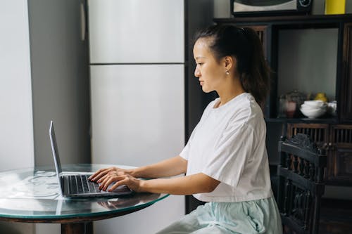 Young Woman Using a Laptop 