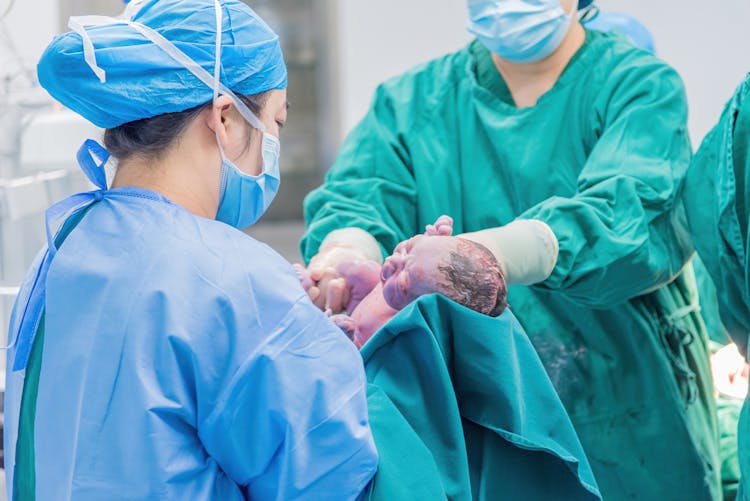 Nurses With Newborn