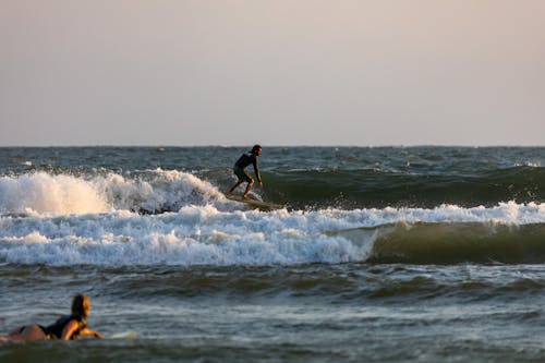 Surfer Riding Big Waves