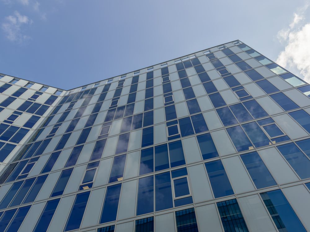 High Rise Building with Glass Windows · Free Stock Photo