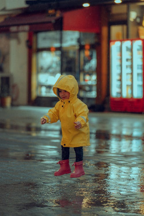 Boy Wearing Yellow Raincoat