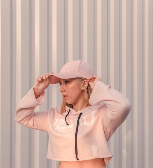 Photo of Woman Wearing Pink Crop Top