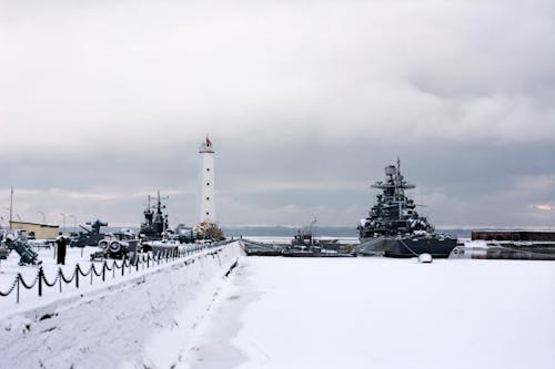 Lighthouse and Harbor in Winter 