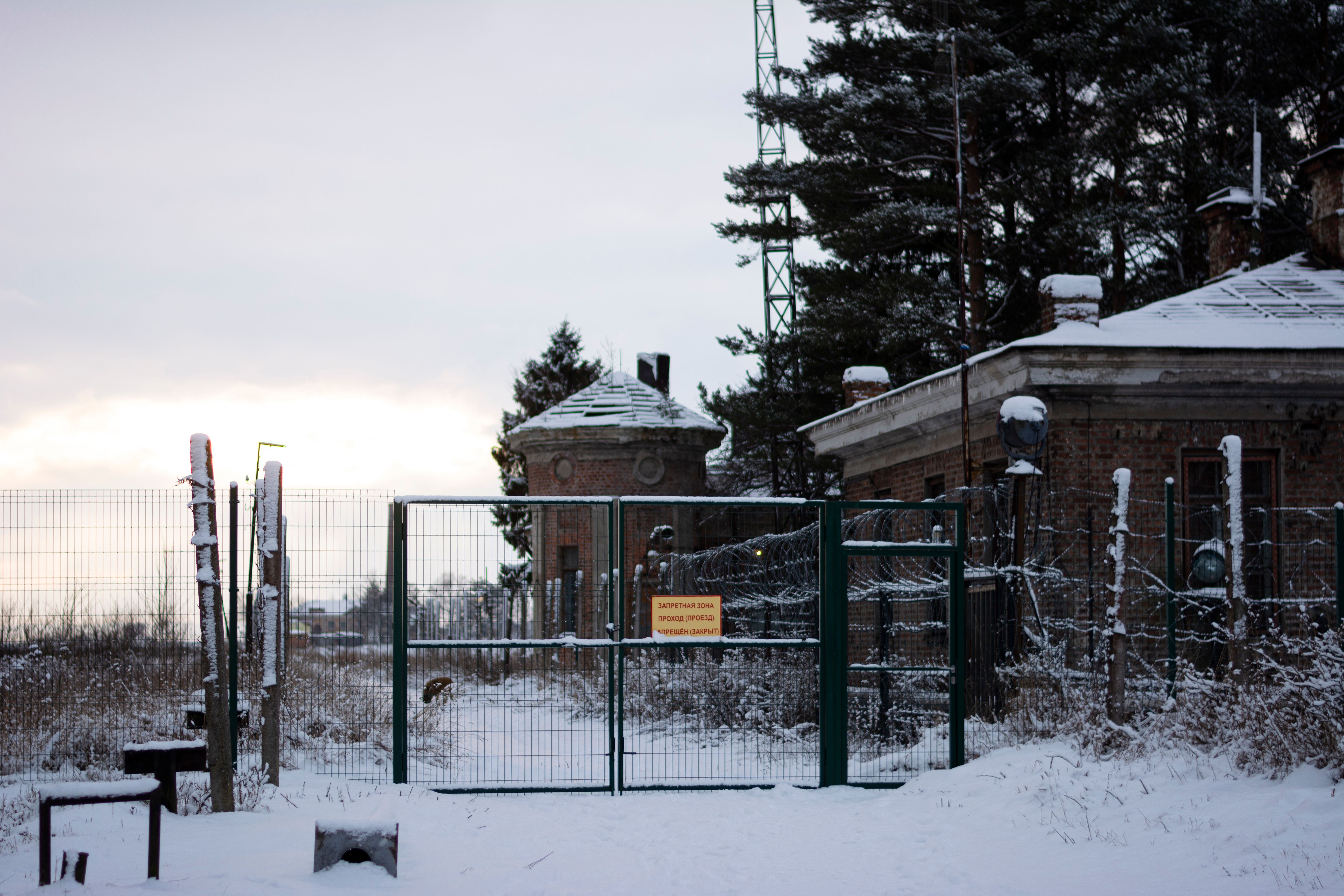A Gate Is Covered In Snow And Has A Fence Around It · Free Stock Photo
