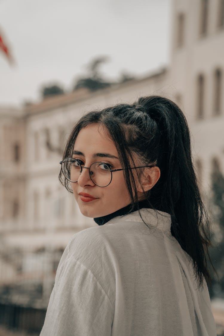 Portrait Of A Woman Wearing Glasses