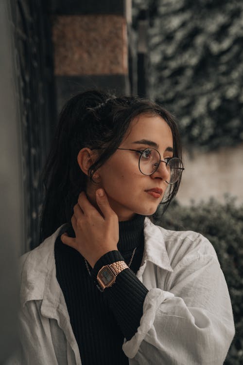 Photo of a Woman Wearing Glasses and a Watch · Free Stock Photo