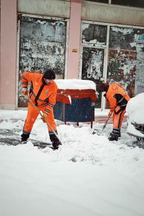 People Working at Removing Snow