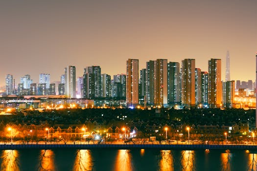 A breathtaking view of a city's skyscrapers illuminated against the night sky.