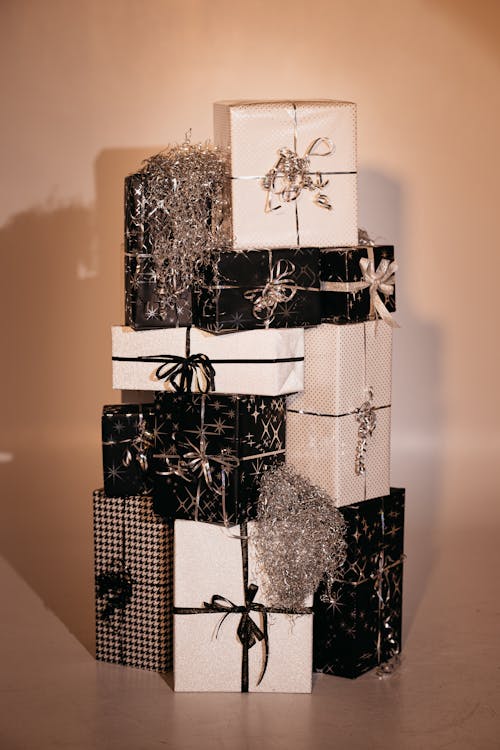 Stacks of Gift Boxes with Silver Ribbons