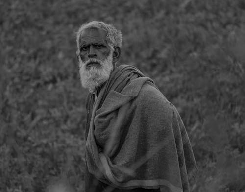 Black and White Picture of an Elderly Man with a Long Gray Beard