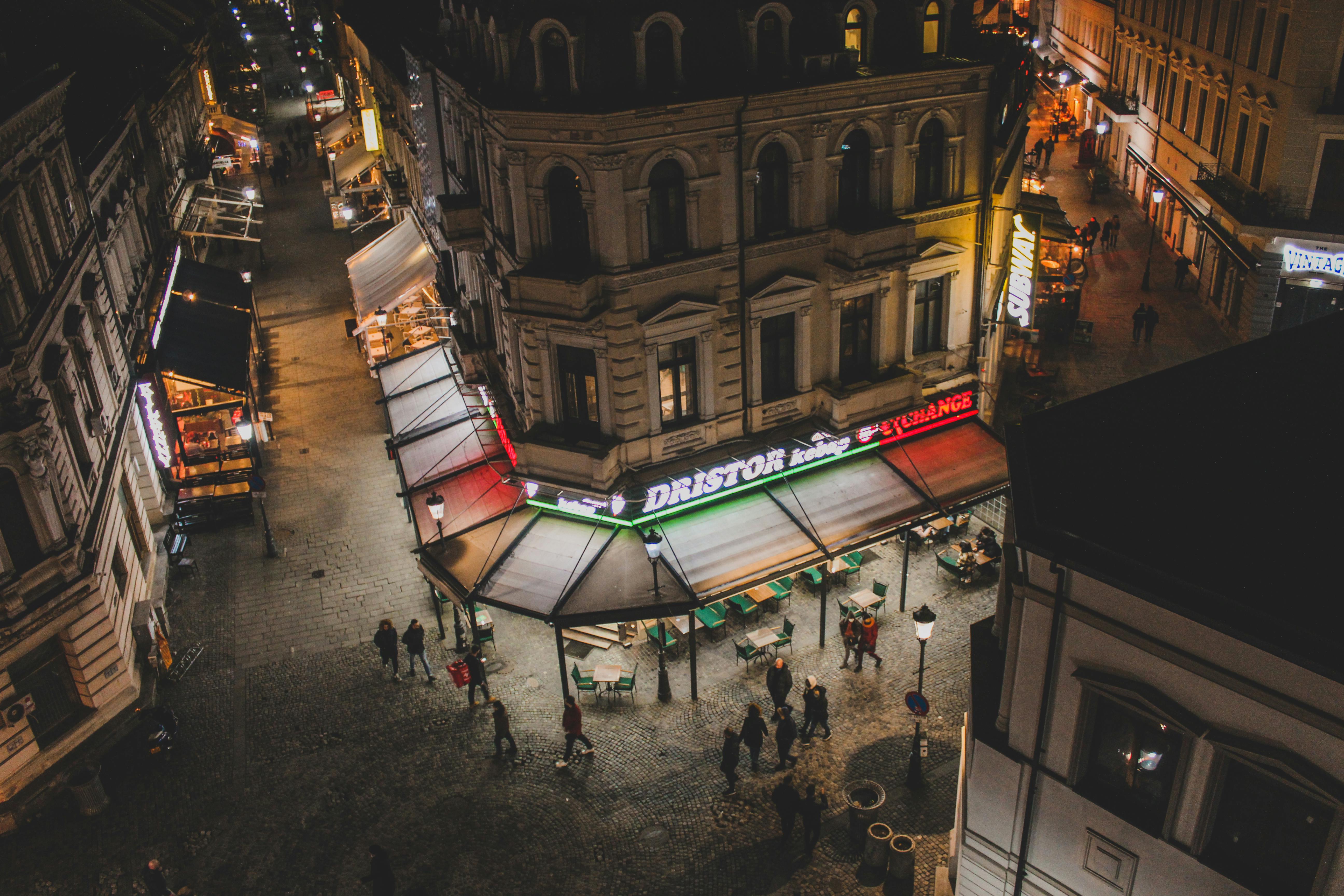 an aerial view of a city street at night