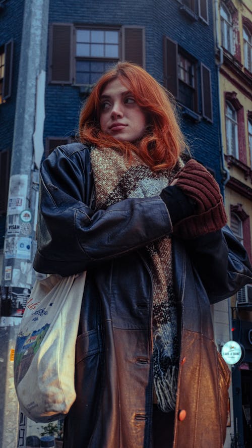 Woman Standing on a Street in Winter