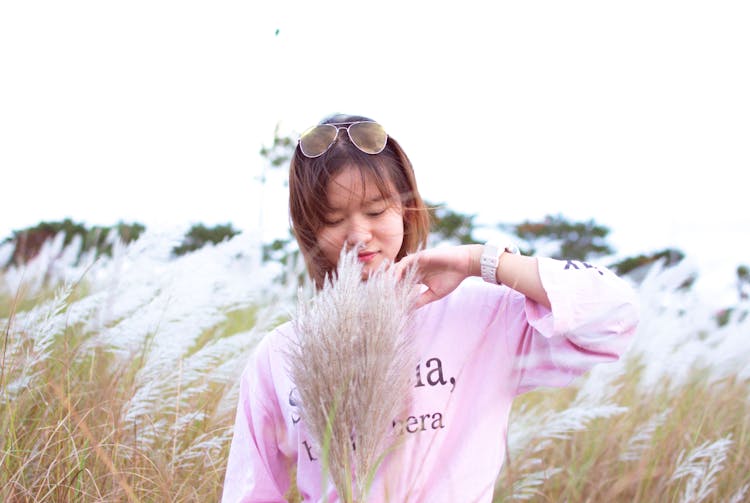 Girl Holding Pampas Grass