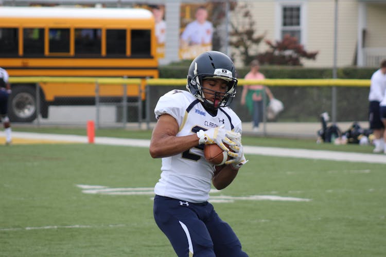 Shallow Focus Photography Of Football Player