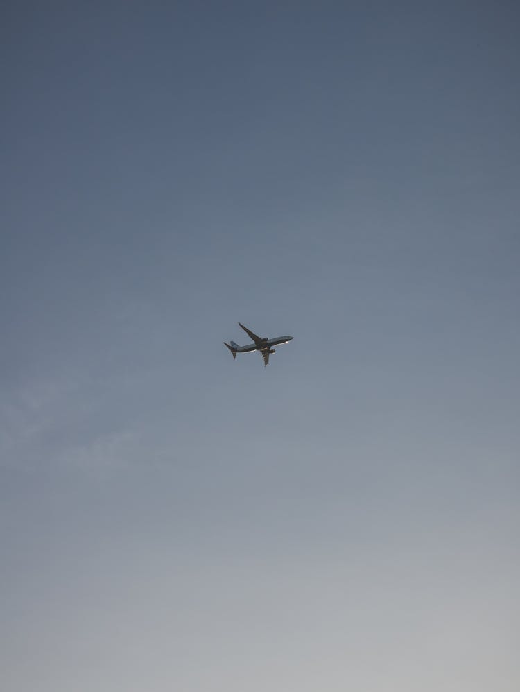 Airplane Flying In The Sky