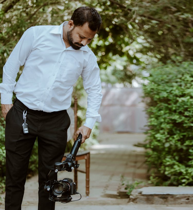 Photo Of An Elegant Photographer At Work