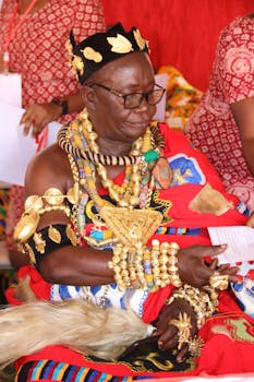 Captured during a vibrant cultural festival in Accra, displaying traditional attire and jewelry.