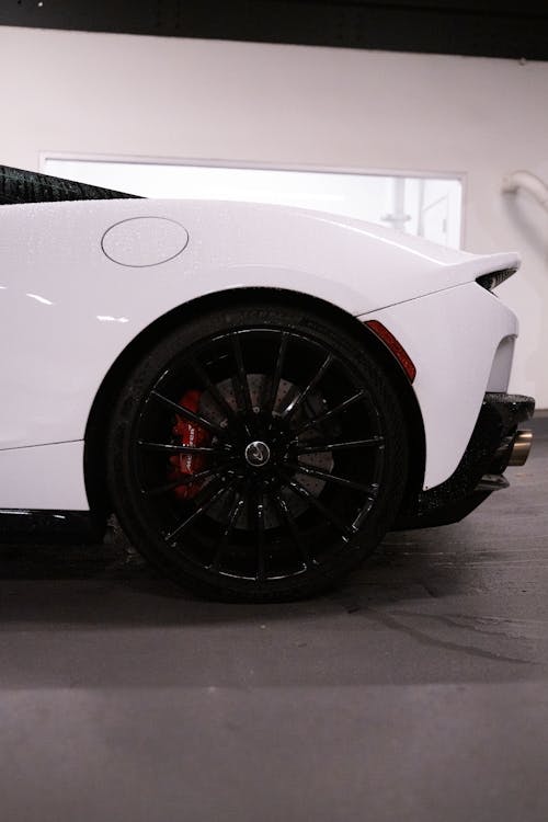 Black Wheel and Mags of a White Car 