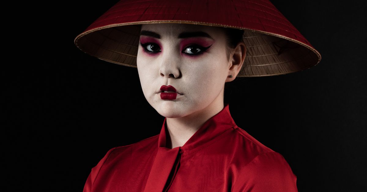 Geisha Hat Geisha in a Red Kimono and Red Conical Hat · Free Stock Photo