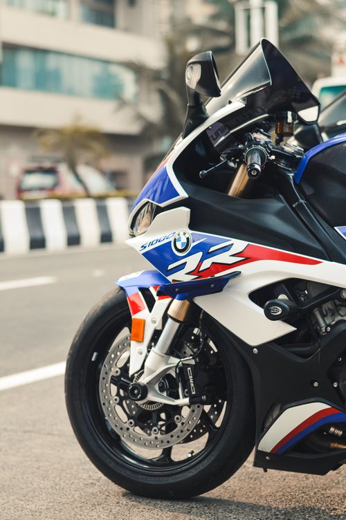 Free Dynamic capture of a sport motorcycle parked on a city street, showcasing urban lifestyle. Stock Photo