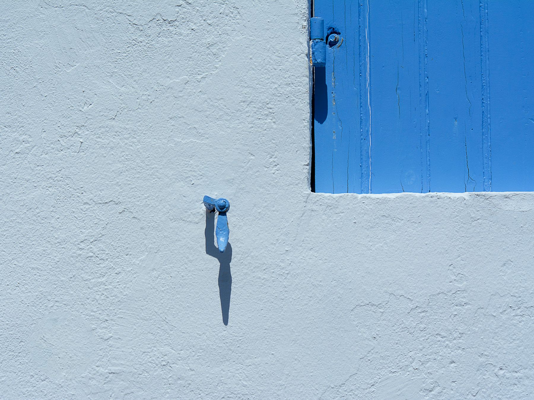 Interior Painting in Bethnal Green — a decorator at work mid-project