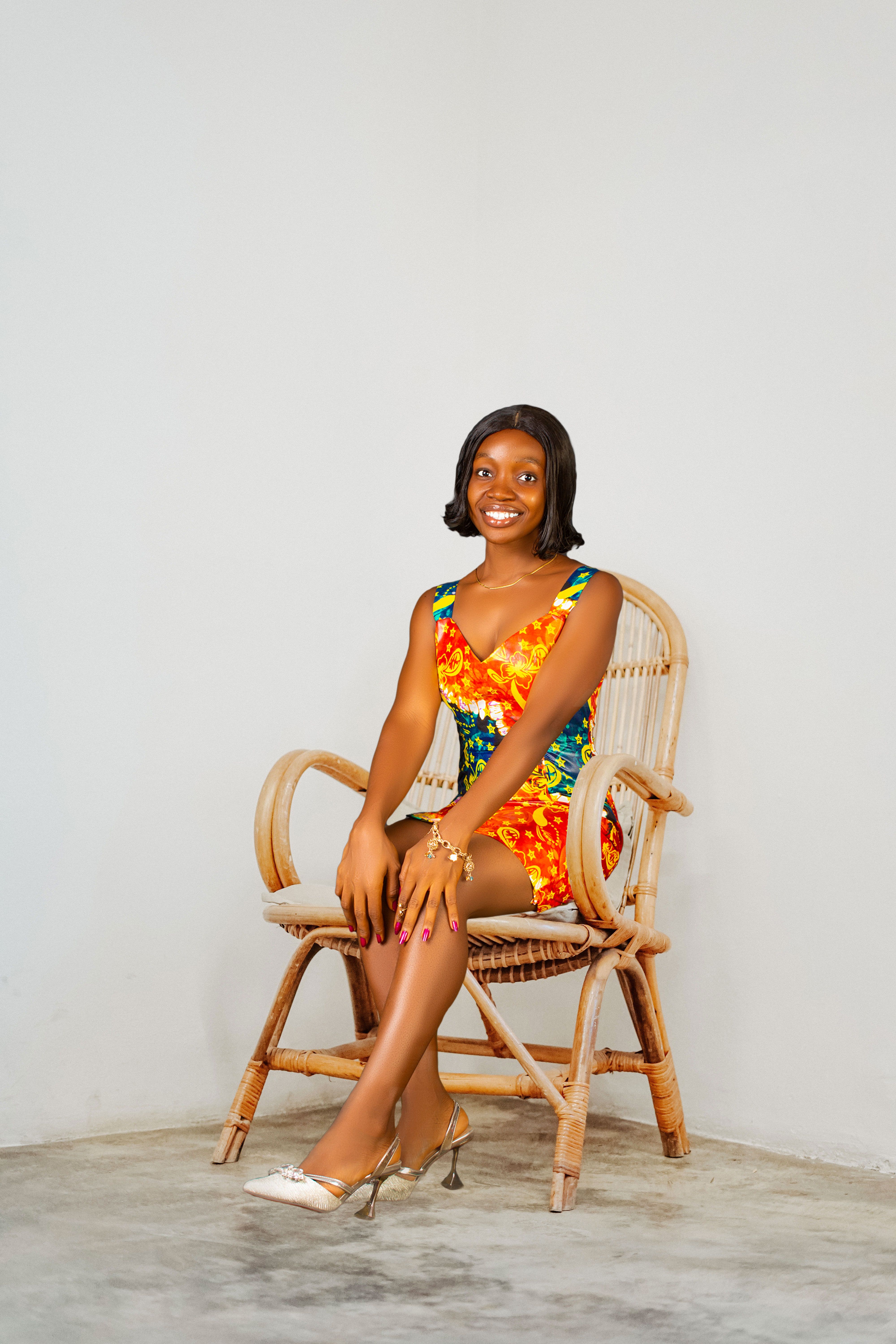 Photo of a Young Attractive Woman Sitting on a Wicker Chair · Free ...