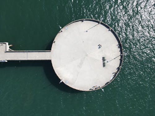 Aerial View of Concrete Bridge on Water