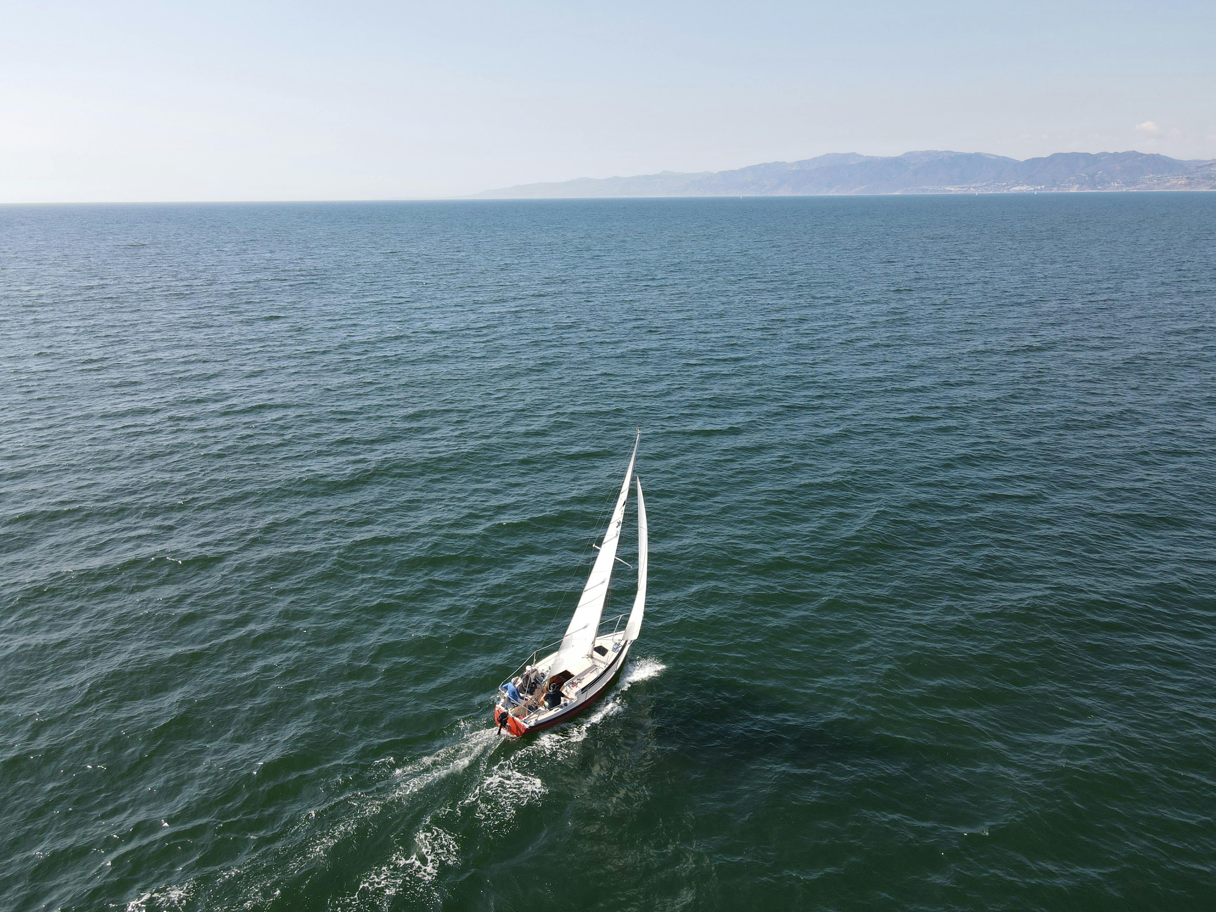 Body of Water and White Yacht · Free Stock Photo