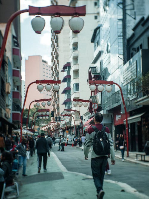 Photo of People Walking in the Liberdade District, Sao Paulo, Brasil