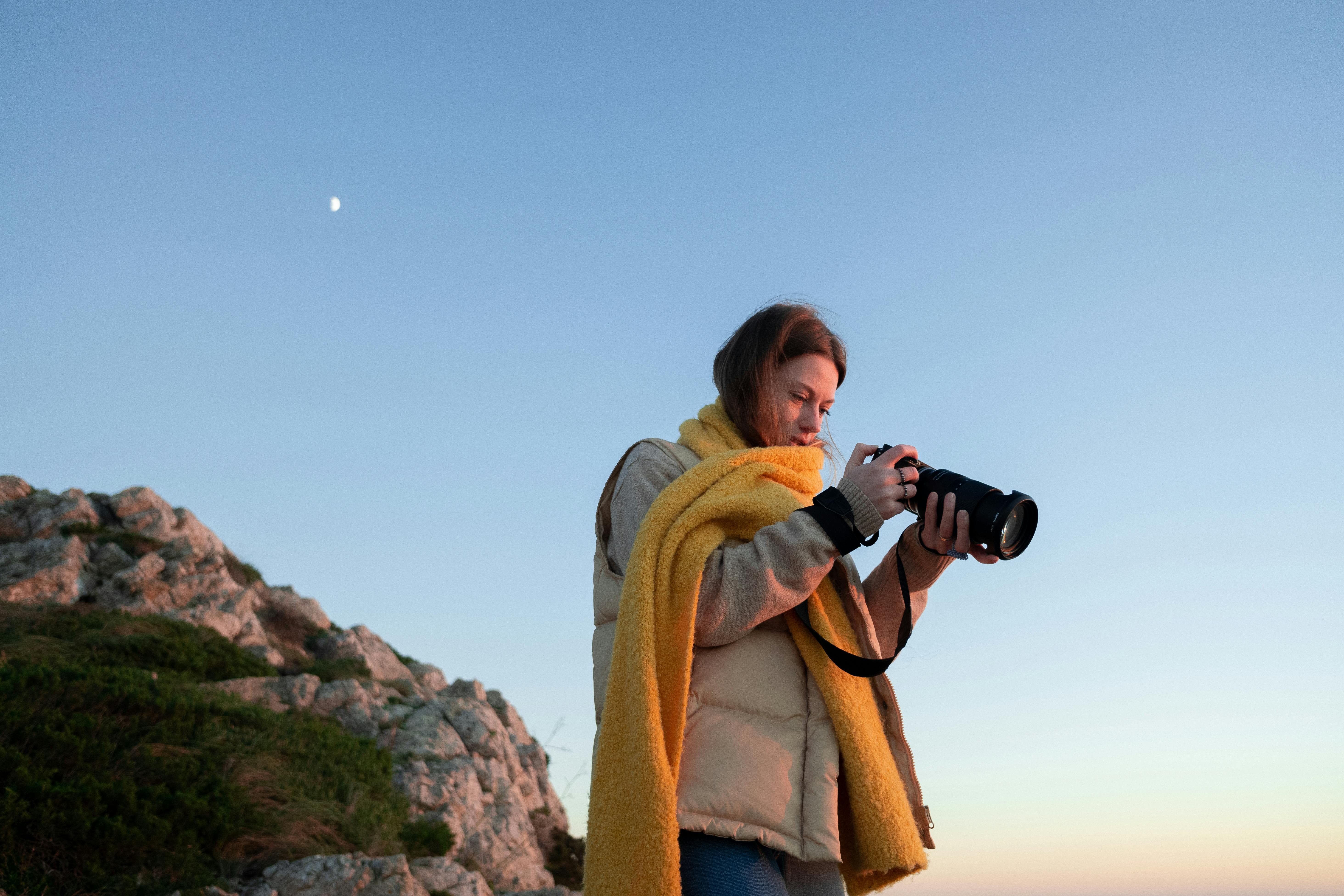 woman holding a camera