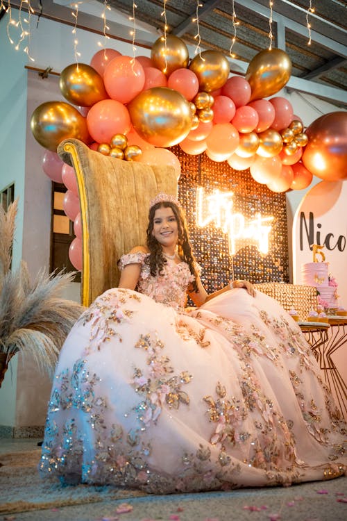 Woman Sitting in Wedding Dress