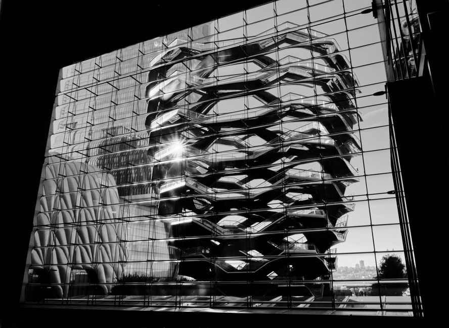 Striking black and white photo of The Vessel in New York City, showcasing modern architecture.