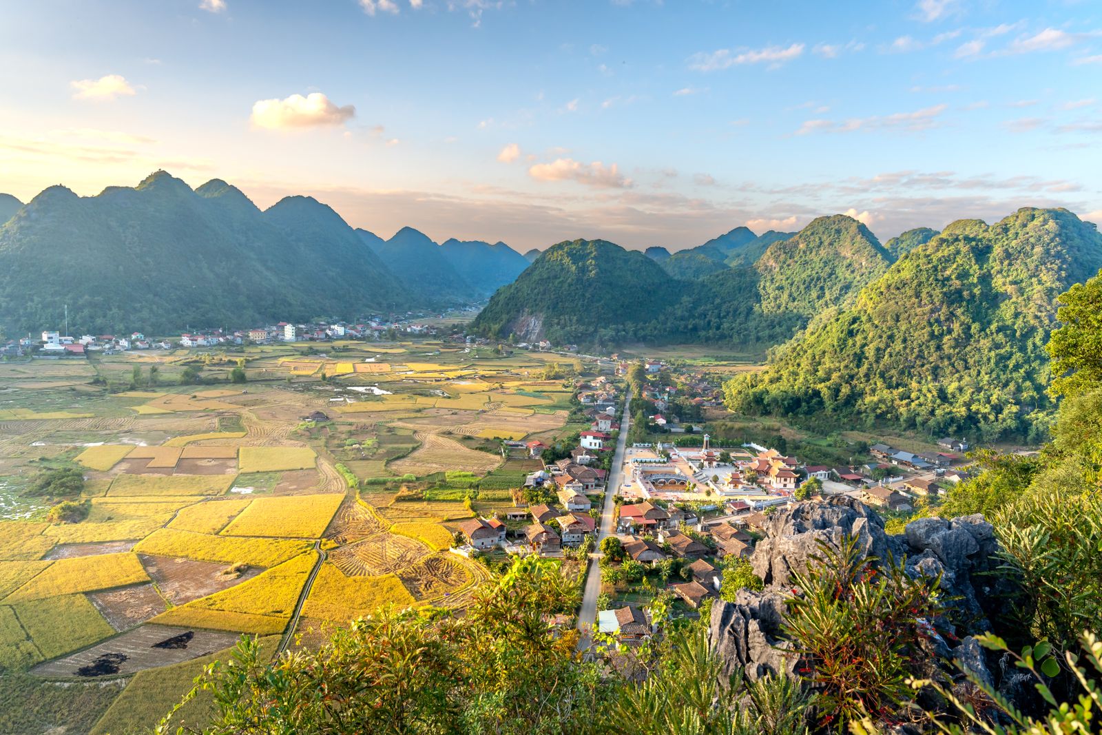 Mountain village at sunrise in northern Vietnam with warm morning light