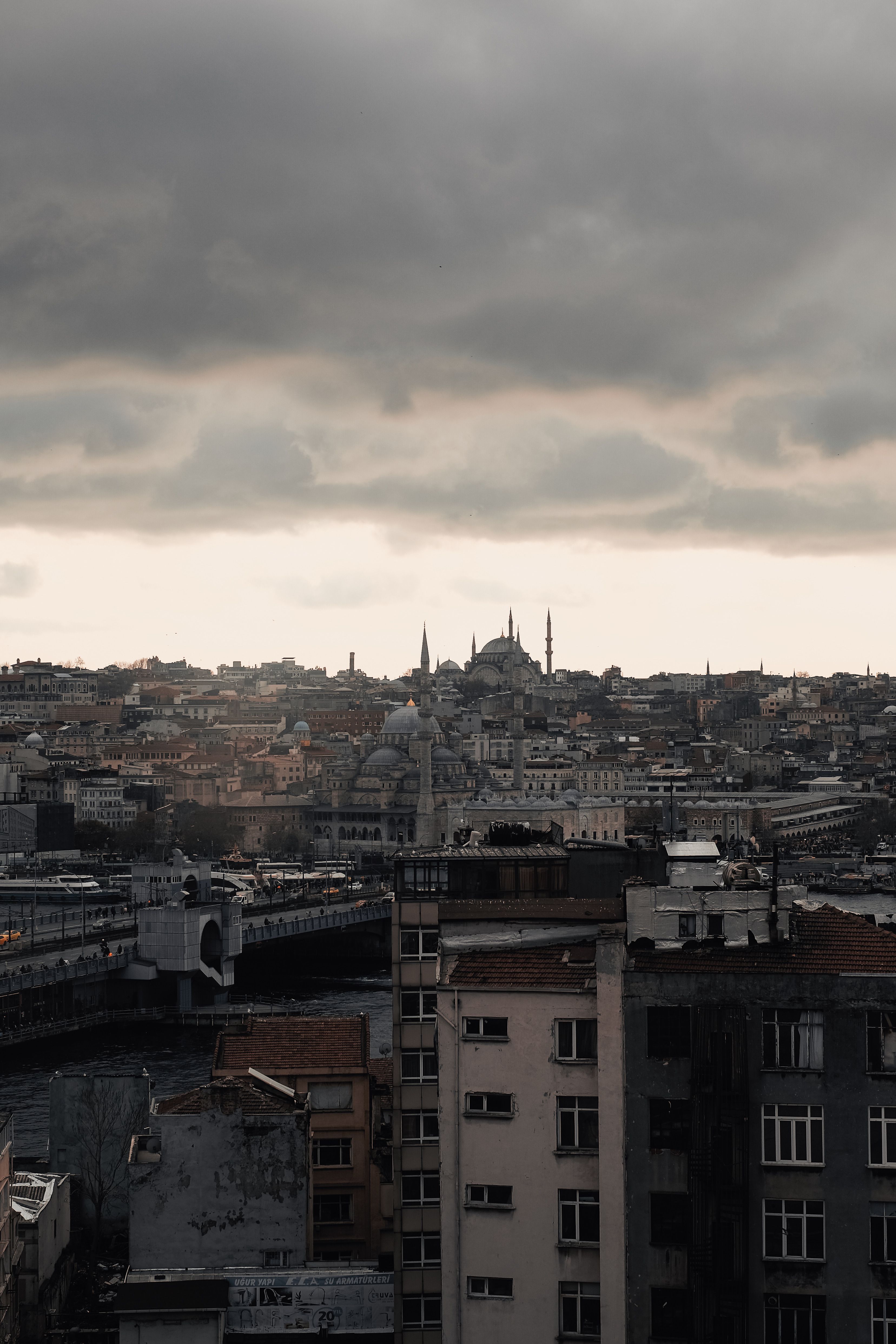 Aerial Photography of City Buildings under Cloudy Sky · Free Stock Photo