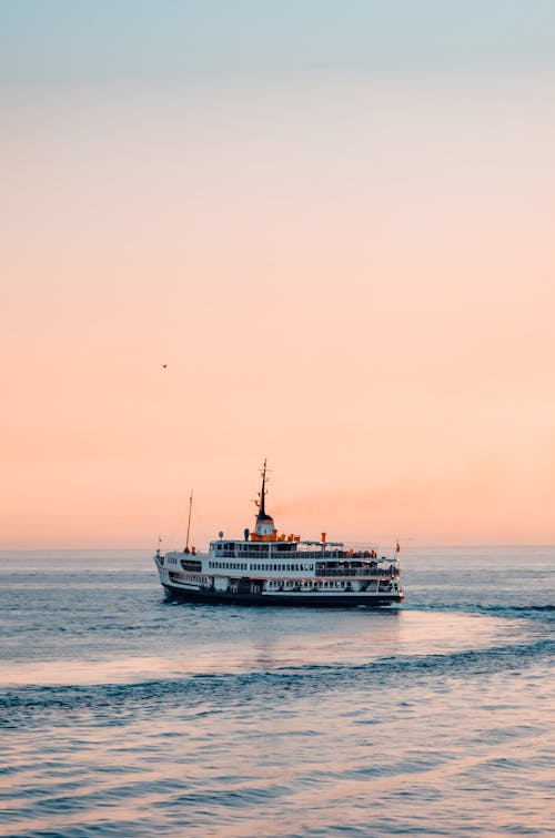 Passenger Ship on the Sea at Sunset 
