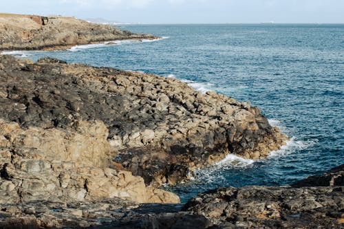 Foto d'estoc gratuïta de àrid, Costa, mar