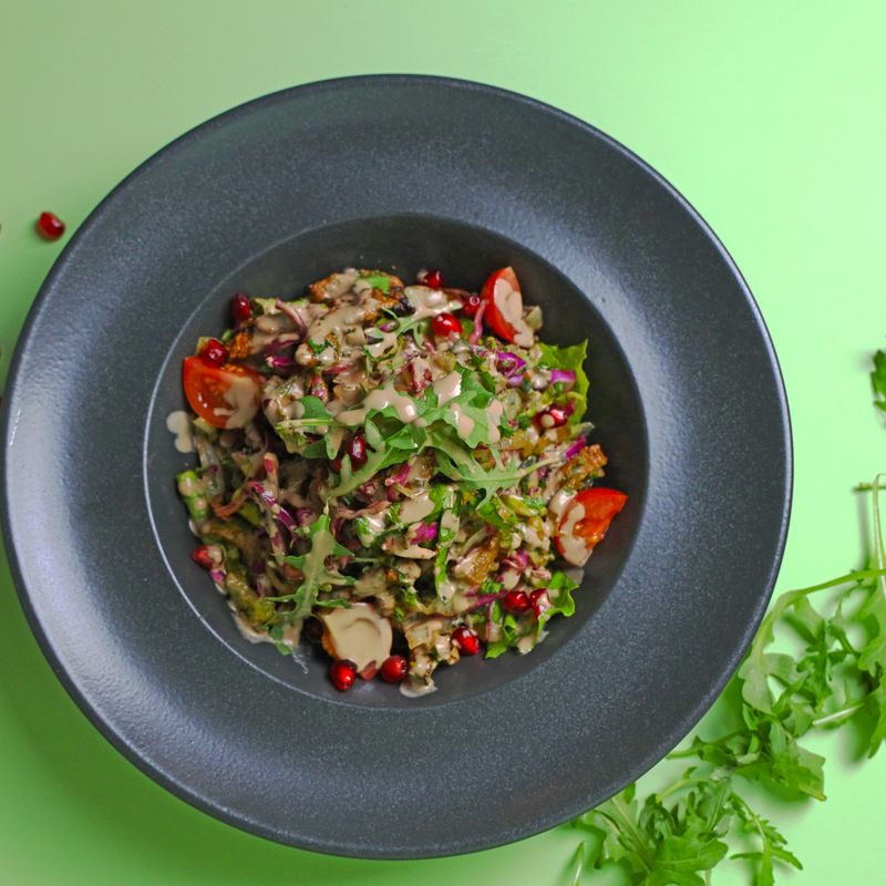 Charred Eggplant and Lentil Bulgur Salad with Pomegranate Molasses
