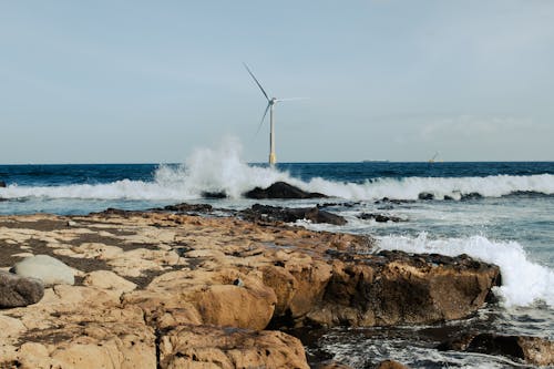 Foto d'estoc gratuïta de aerogenerador, aixafament, Costa