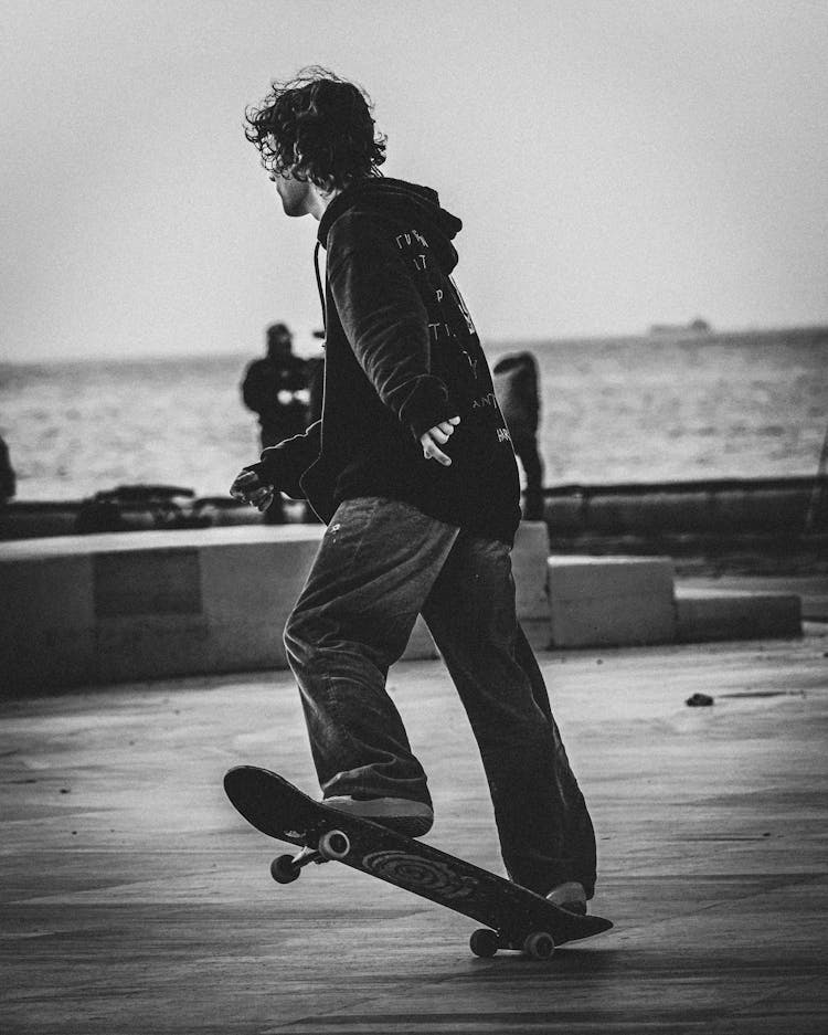 Grayscale Photo Of A Skater 