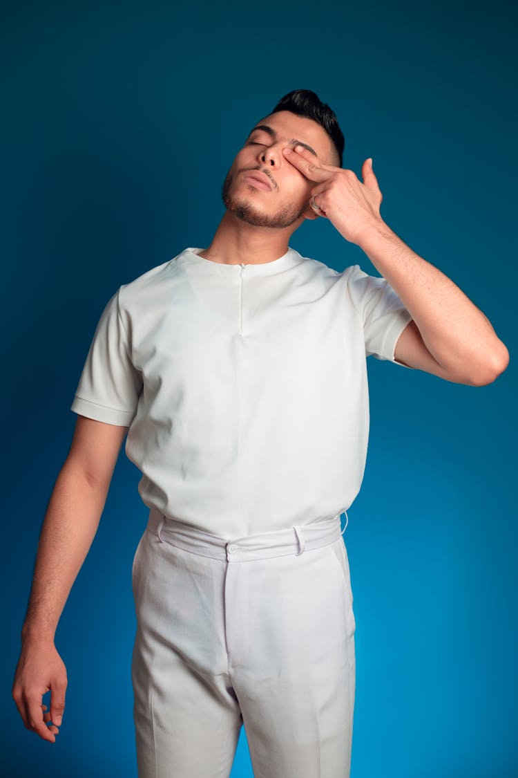 Photo Of A Man Covering His Eye