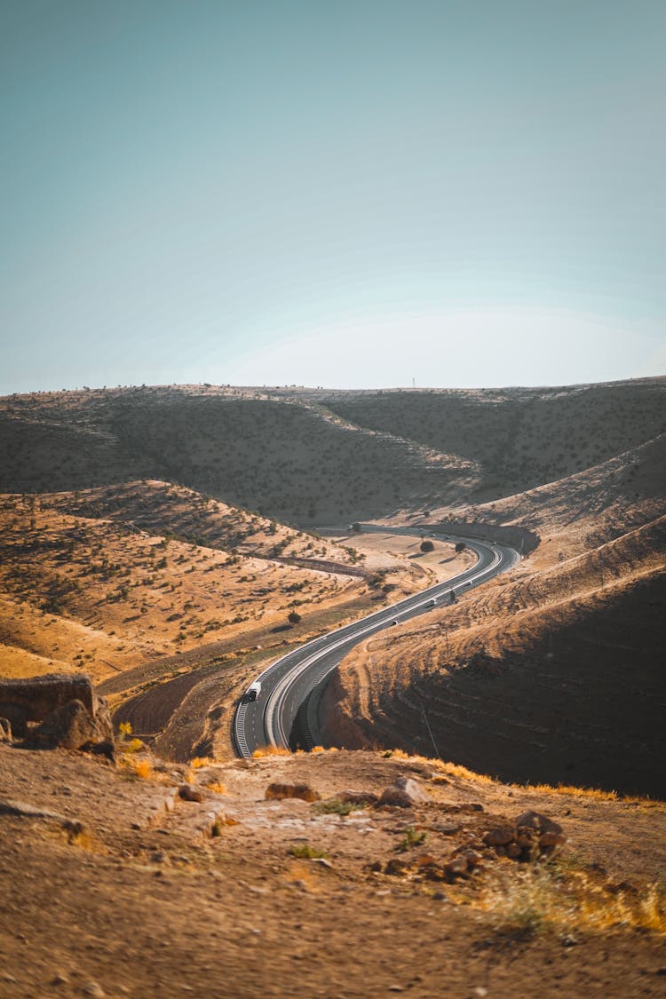 Asphalt Road Through A Desert