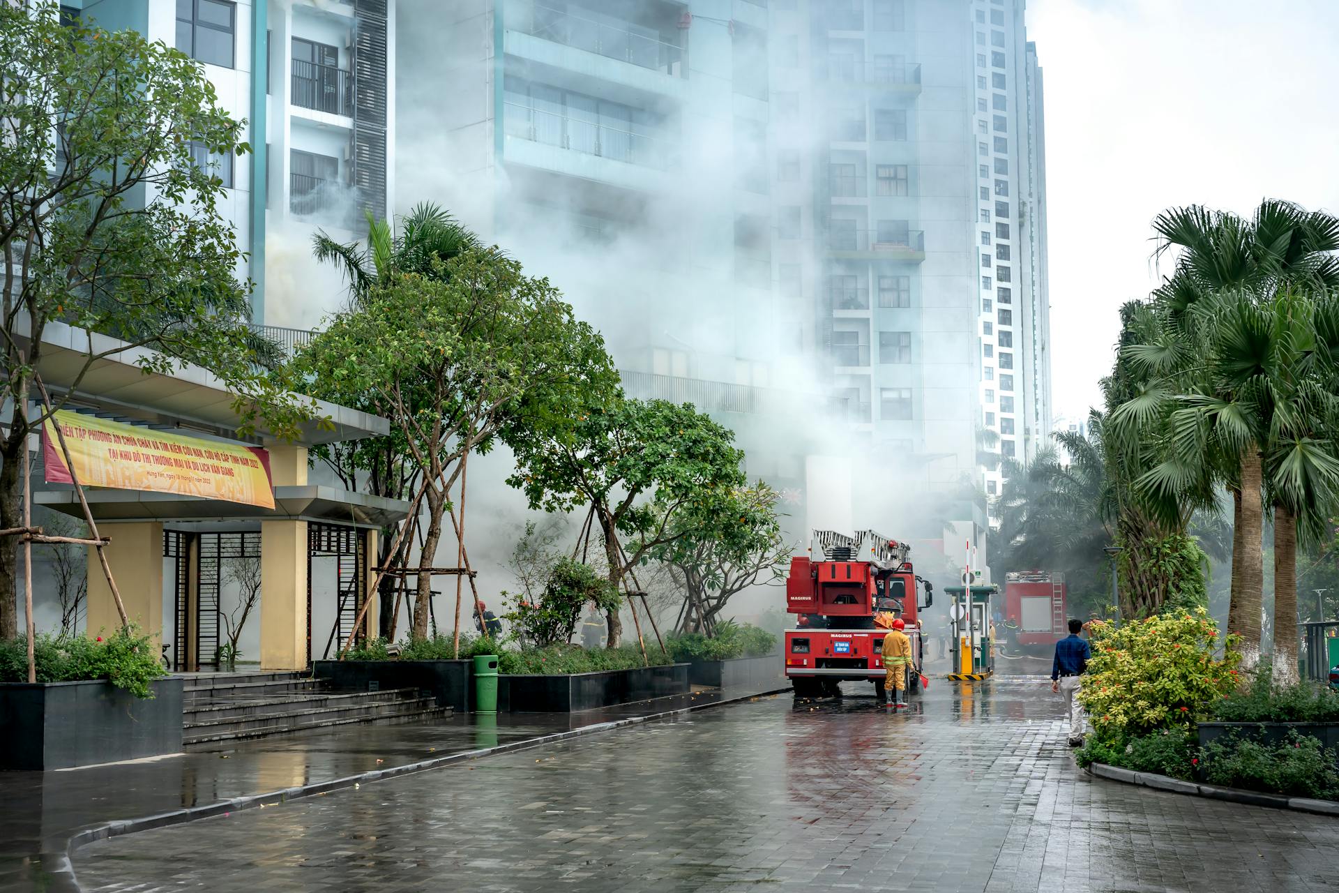 Firefighters Extinguishing a Fire of a Building in City