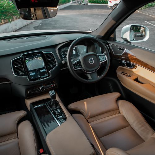 Free Explore the luxurious leather interior of a modern car with high-tech dashboard and sleek design. Stock Photo