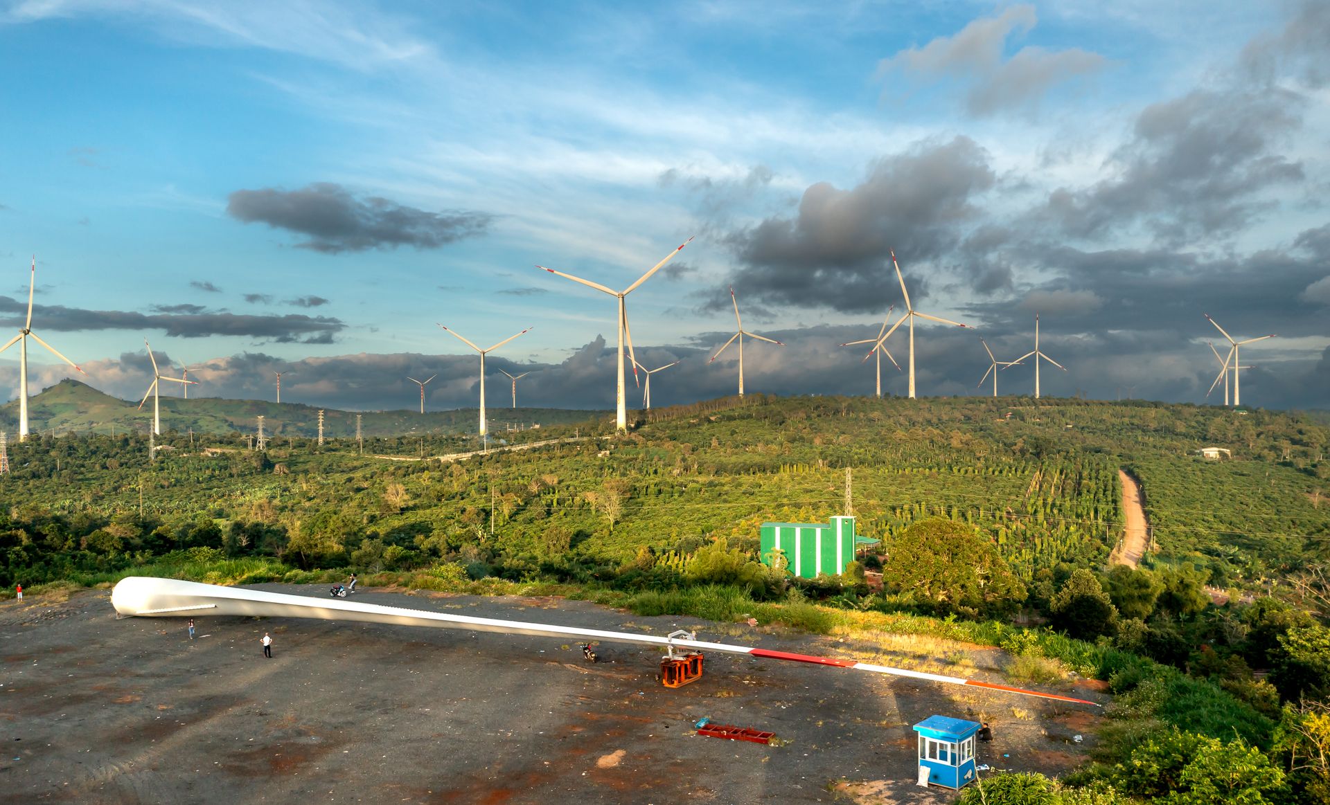 A scenic landscape featuring numerous wind turbines generating renewable energy.
