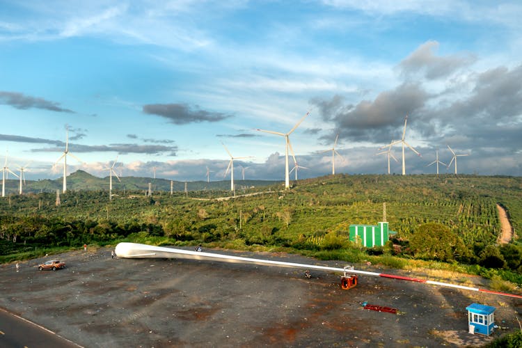 Wind Turbines On A Farm