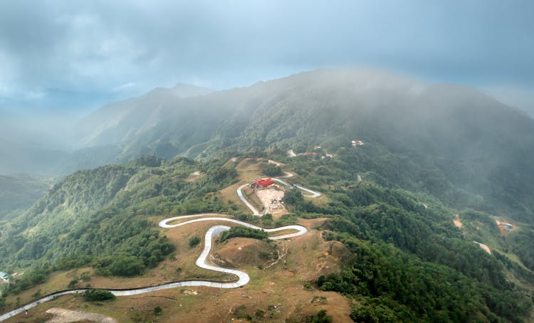 Road In Mountains Landscape In Fog