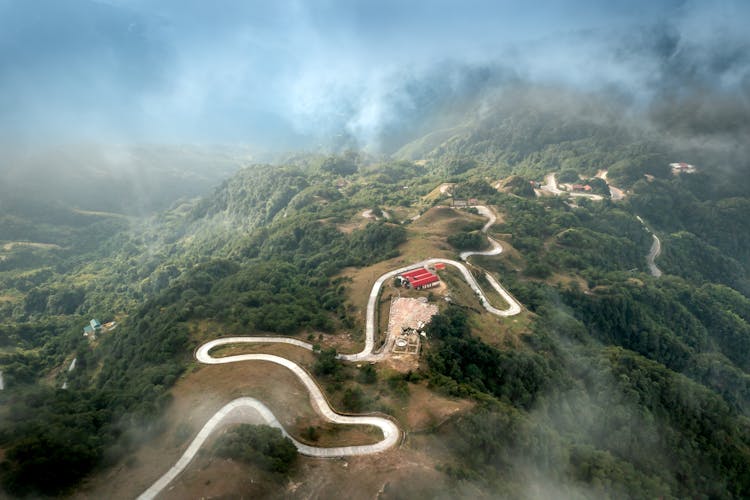 Road In Mountains Landscape In Fog