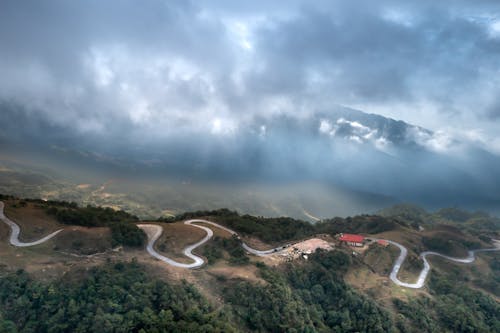 Road in Mountains Landscape in Fog