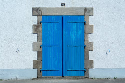Blue Wooden Door to a Building 